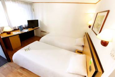Twin Room with twin beds and one junior bed