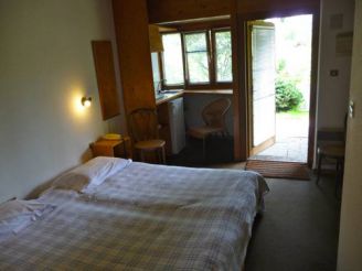 Номер-студио с 2 односпальными кроватями и видом на сад