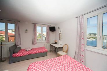 Family Room (2 Adults + 2 Children) with sea and village view 